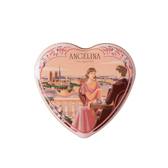 Front view of a closed Angelina heart-shaped tin with a romantic Parisian illustration.
