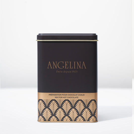 Elegant black and gold Angelina Paris tin filled with premium hot chocolate mix, featuring an Art Deco pattern and “Angelina Paris depuis 1903” printed on the front.