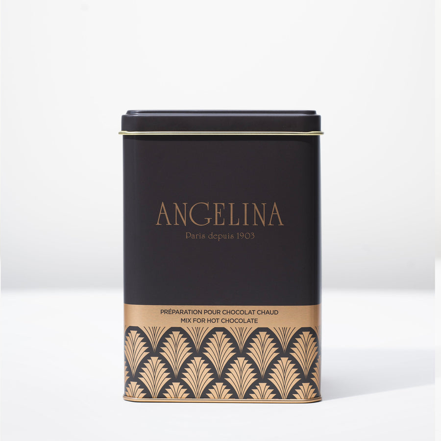 Elegant black and gold Angelina Paris tin filled with premium hot chocolate mix, featuring an Art Deco pattern and “Angelina Paris depuis 1903” printed on the front.